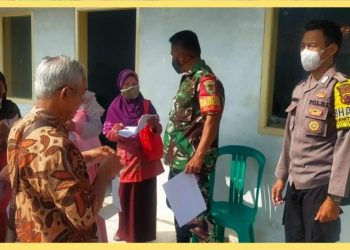 Polsek Cikoneng Polres Ciamis Giat Monitoring Penyaluran BST Dan BLT Minyak Goreng