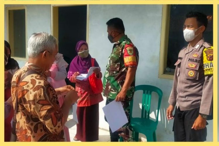 Polsek Cikoneng Polres Ciamis Giat Monitoring Penyaluran BST Dan BLT Minyak Goreng